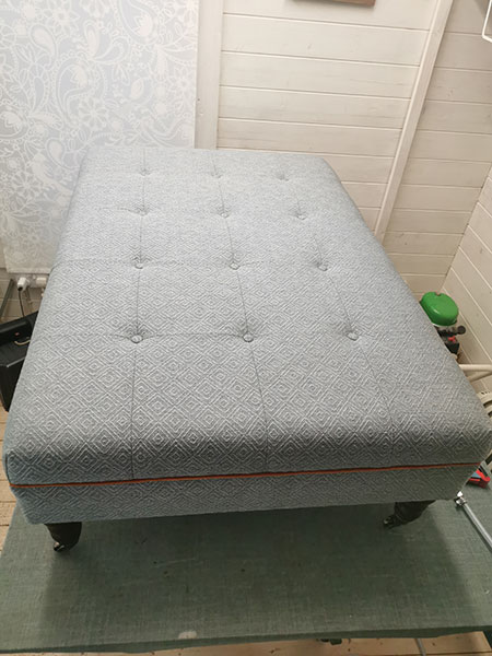 reupholstered footstool by Finnook Upholstery Services